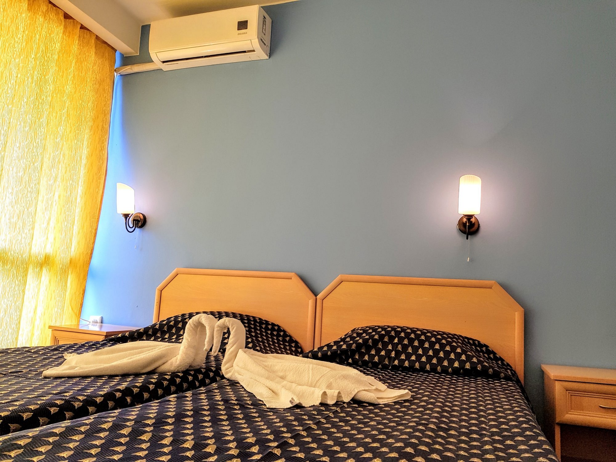 Double room with decorative towels